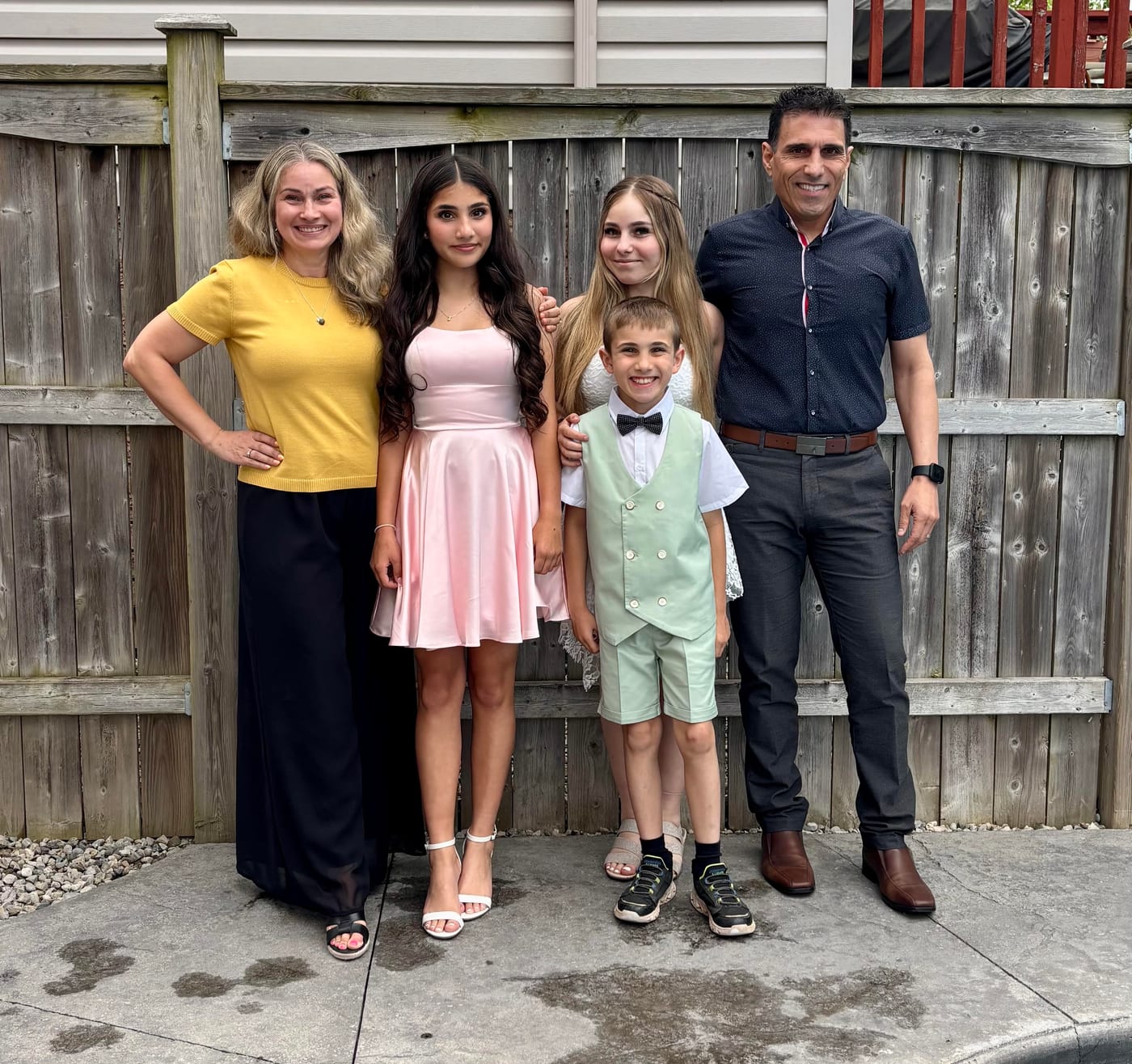 Sam Hajar with his wife and three children